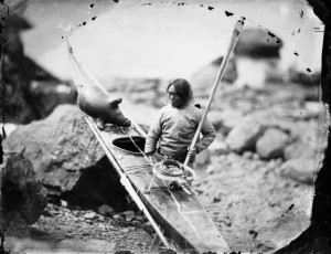 Inuit man with a kayak in 1854
